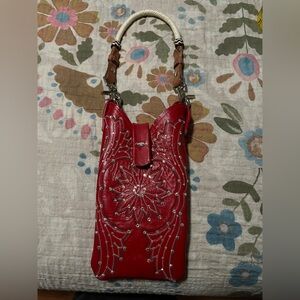 Red Embossed Leather Handbag. NWOT